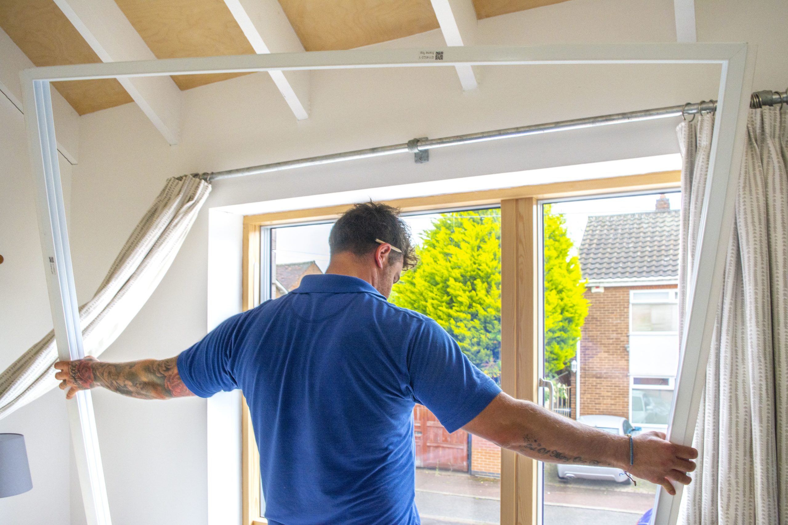 Member of Notaro Windows team installing secondary glazing in Somerset